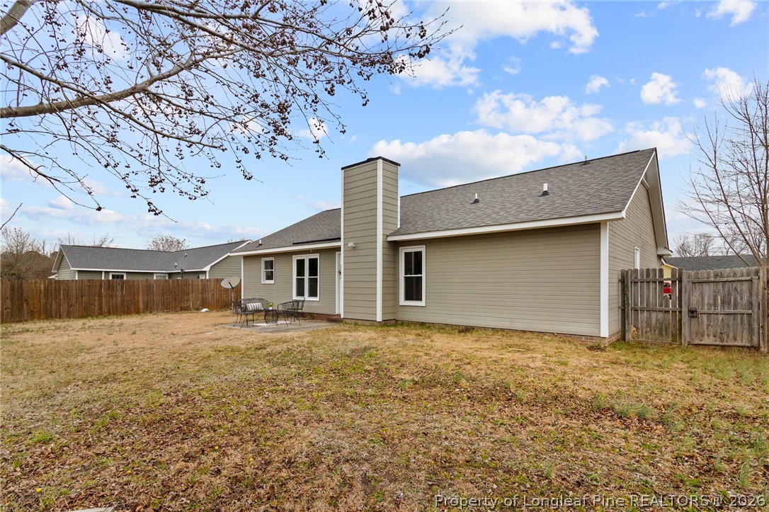 388 Woodwind Drive Spring Lake, NC 28390 - Photo 29 of 31 a backyard of a house