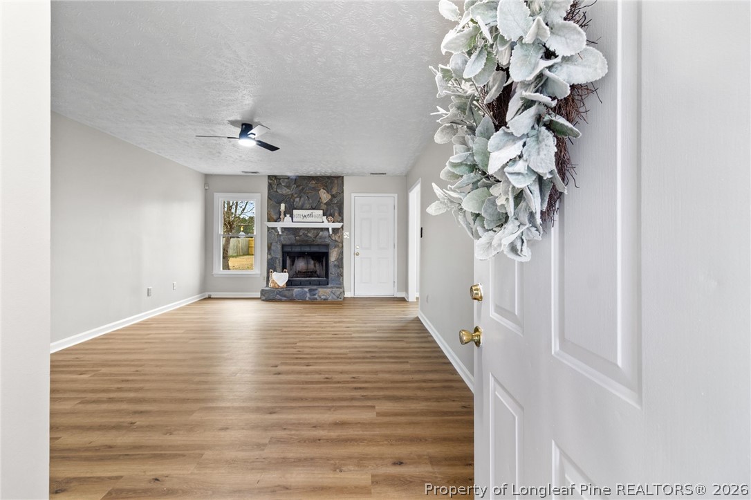 388 Woodwind Drive Spring Lake, NC 28390 - Photo 6 of 31 a view of a livingroom with wooden floor
