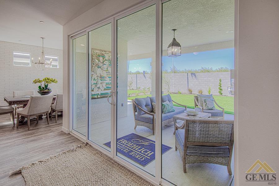 Undisclosed Address Bakersfield, CA 93311 - Photo 7 of 9 a living room with furniture and a table