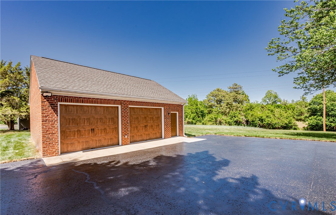 2018 Valentine Road Henrico, VA 23228 - Photo 1 of 65 a view of an house with backyard and garden