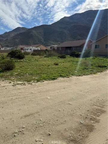 a view of a houses with an outdoor space
