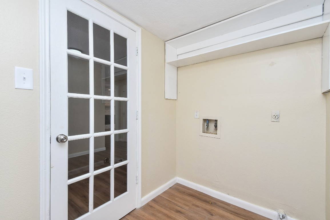 4730 Theall Road Houston, TX 77066 - Photo 26 of 32 a view of wooden floor with entryway