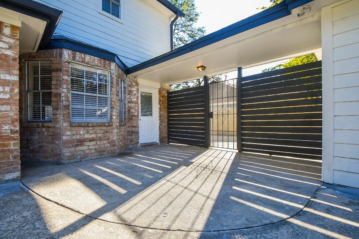 4730 Theall Road Houston, TX 77066 - Photo 27 of 32 a view of backyard with wooden stairs