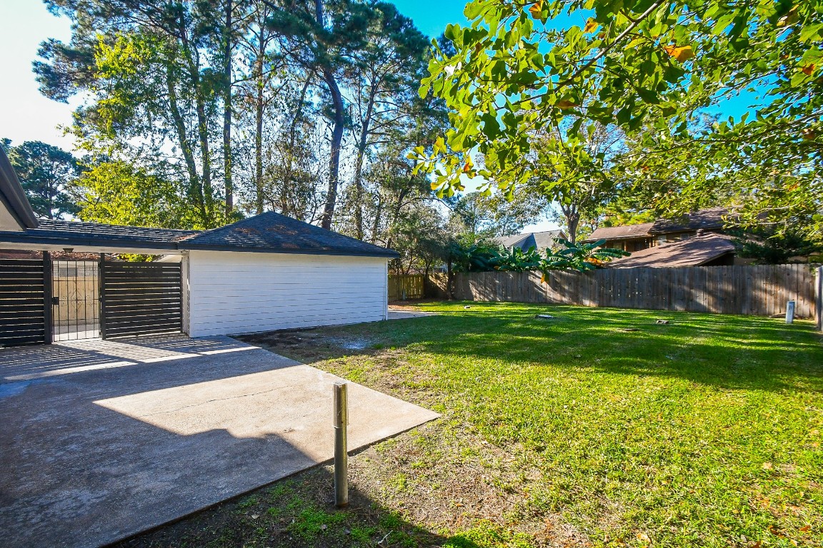4730 Theall Road Houston, TX 77066 - Photo 29 of 32 a view of backyard with green space