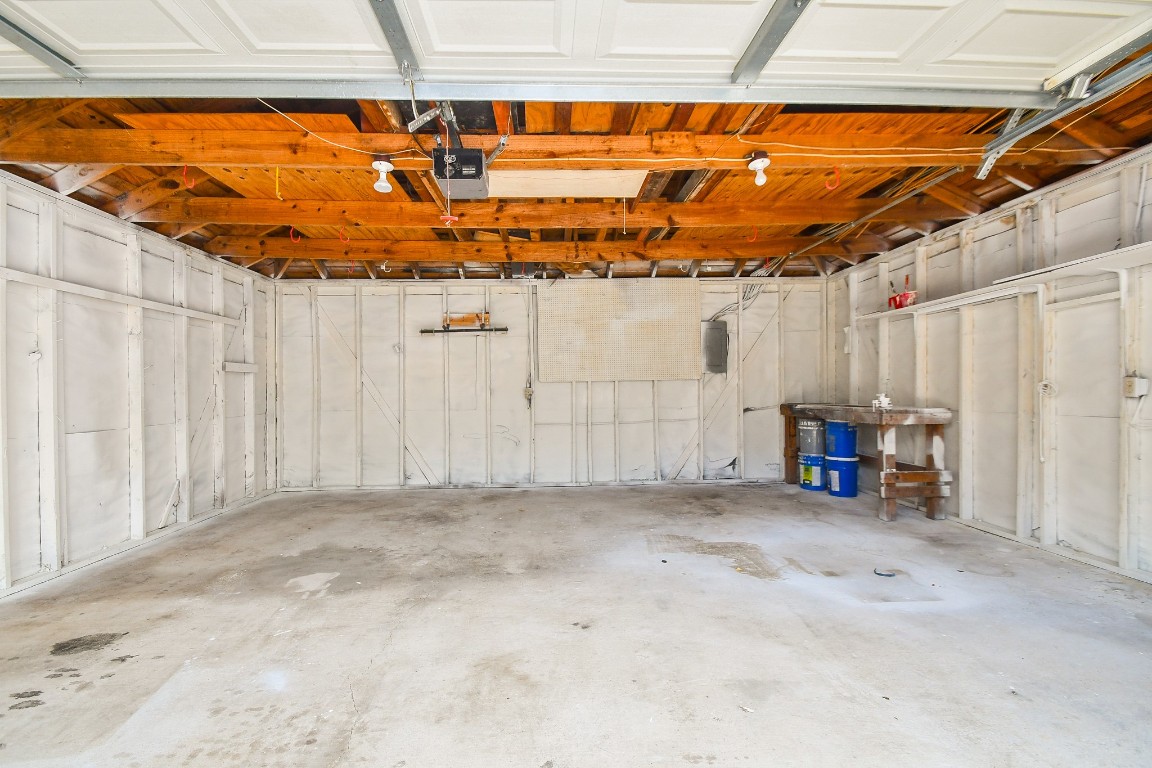 4730 Theall Road Houston, TX 77066 - Photo 32 of 32 a view of a room with wooden walls