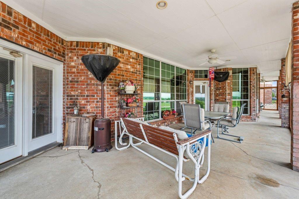 641 Comanche Lake Road Comanche, TX 76442 - Photo 25 of 34 a building outdoor space with patio furniture and garden