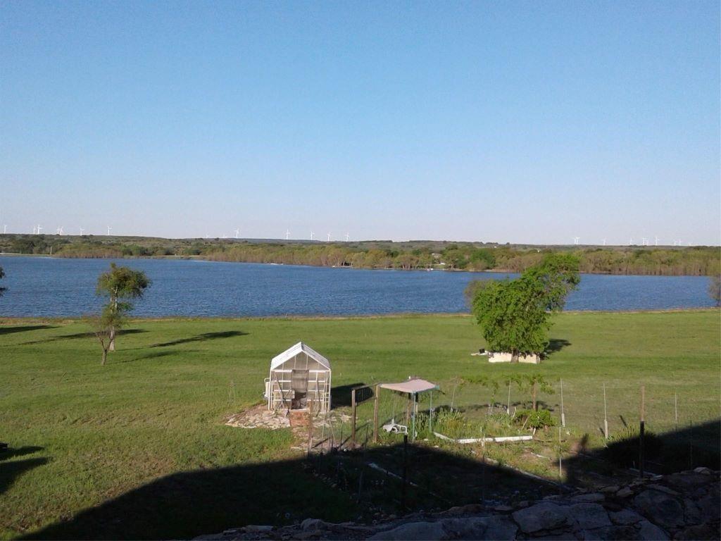 641 Comanche Lake Road Comanche, TX 76442 - Photo 34 of 34 a view of a lake with a big yard