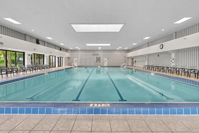 a view of a room with lots of gym equipment