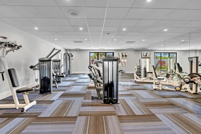 a view of a street with a building in the background