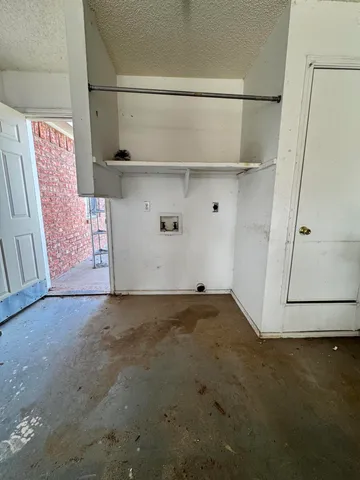 a view of a room with rack on the wall