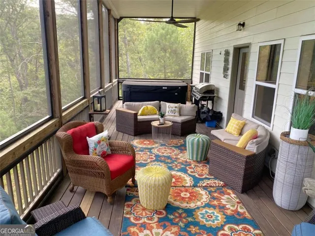 an aerial view of a house with a yard and garden