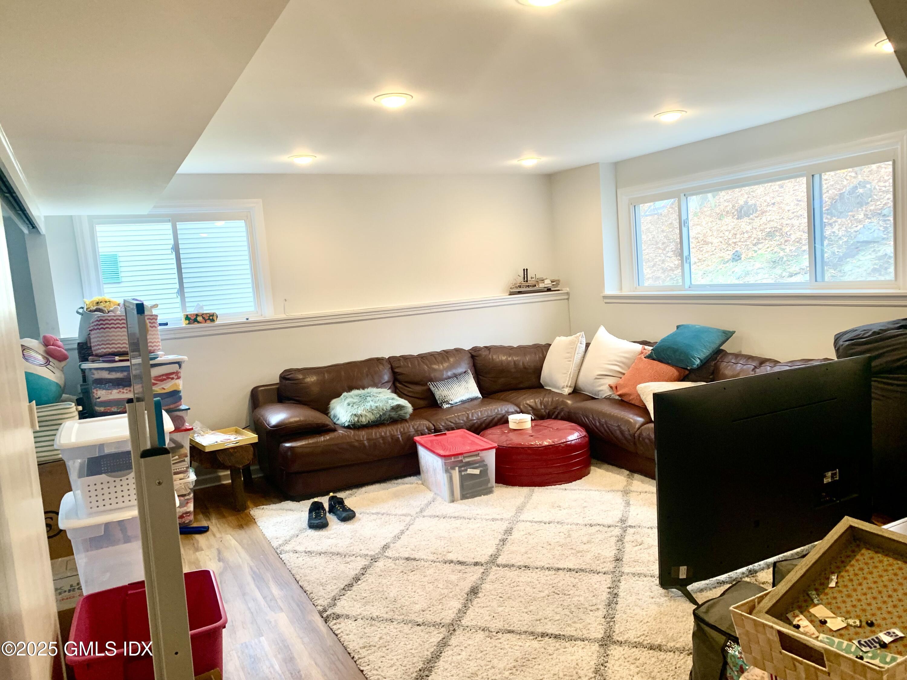 67 Florence Road Riverside, CT 06878 - Photo 19 of 23 a living room with furniture and a window