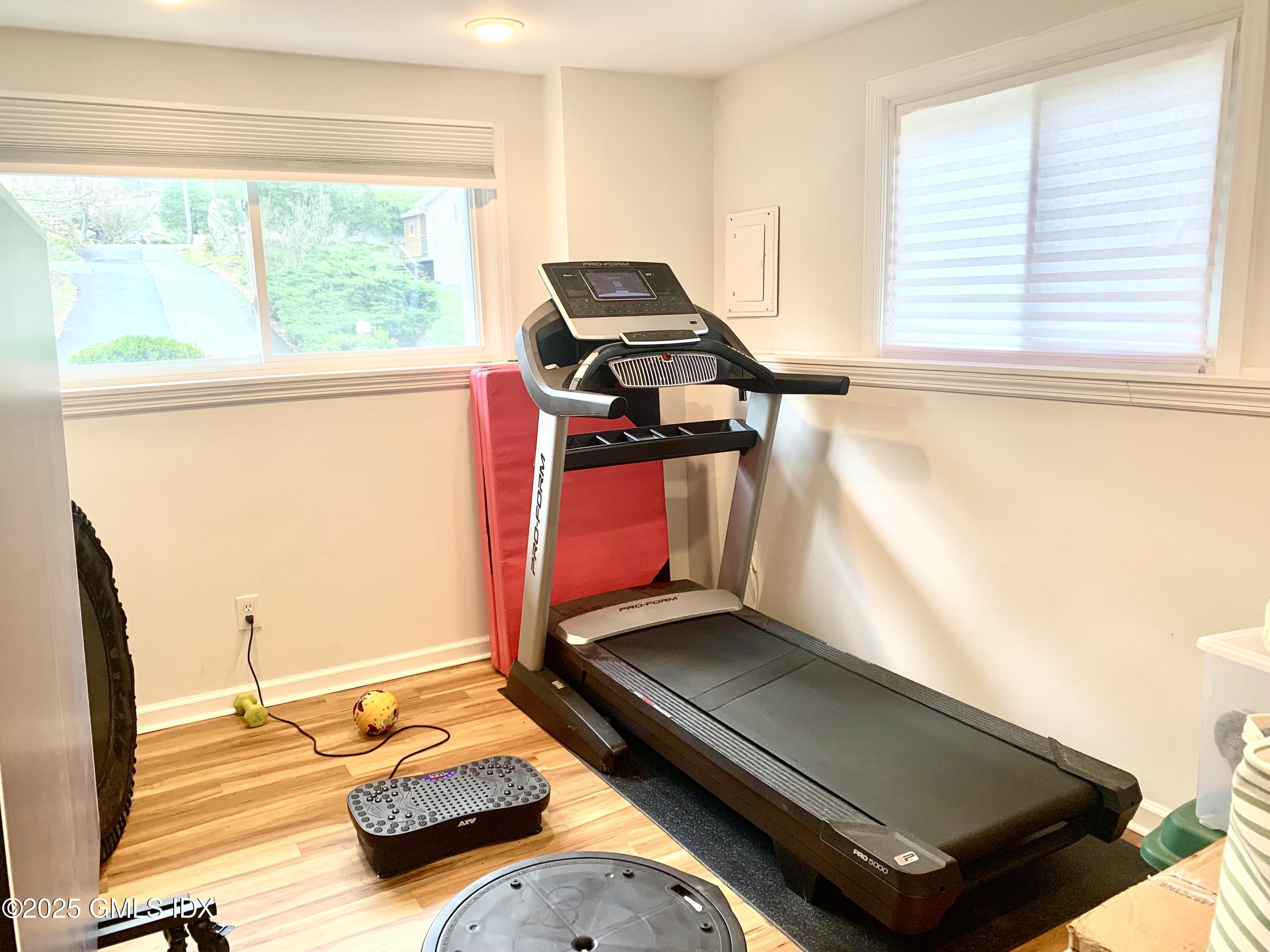 67 Florence Road Riverside, CT 06878 - Photo 21 of 23 a living room with a bed