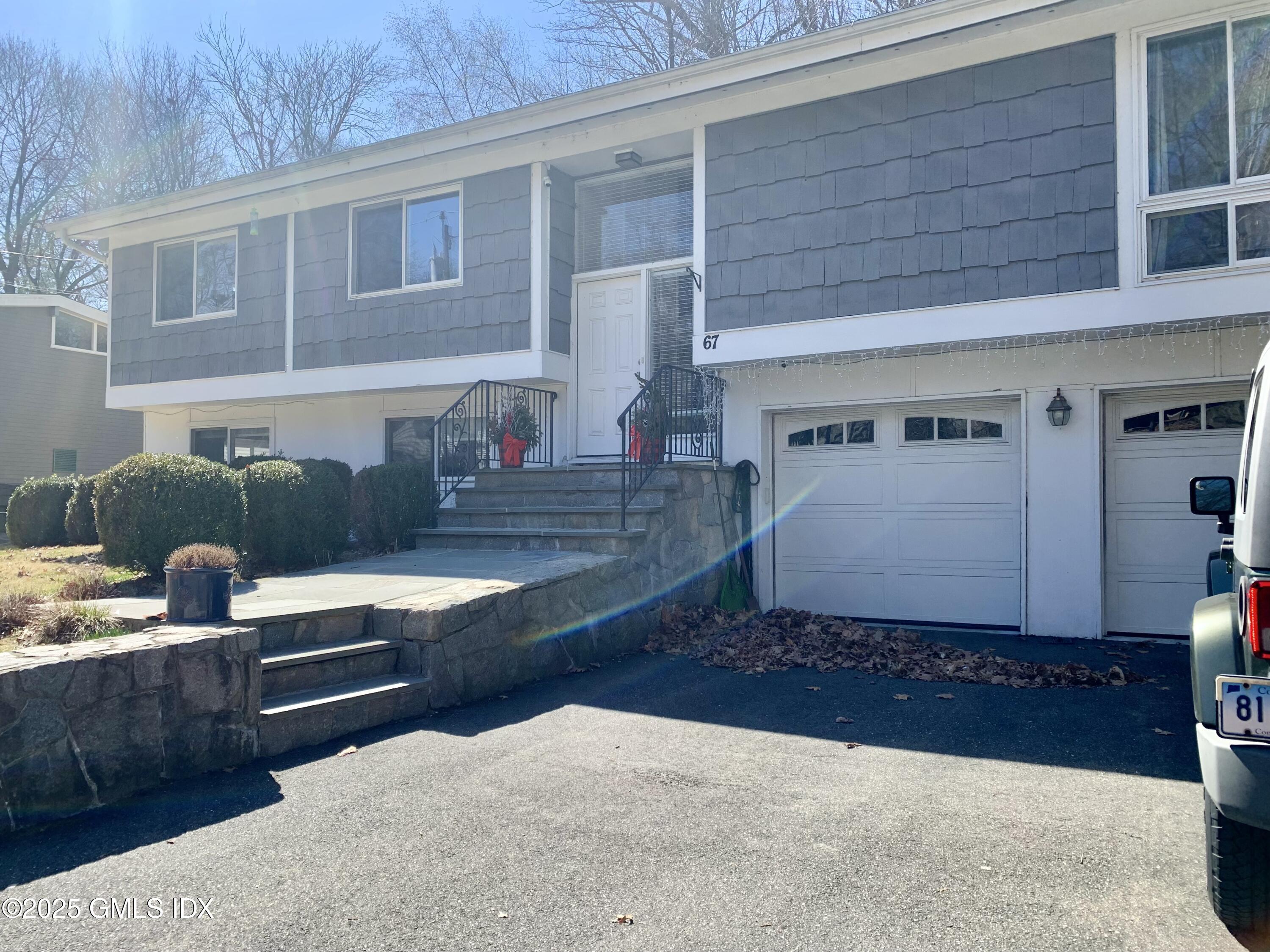 67 Florence Road Riverside, CT 06878 - Photo 23 of 23 a view of a house with a sink and yard