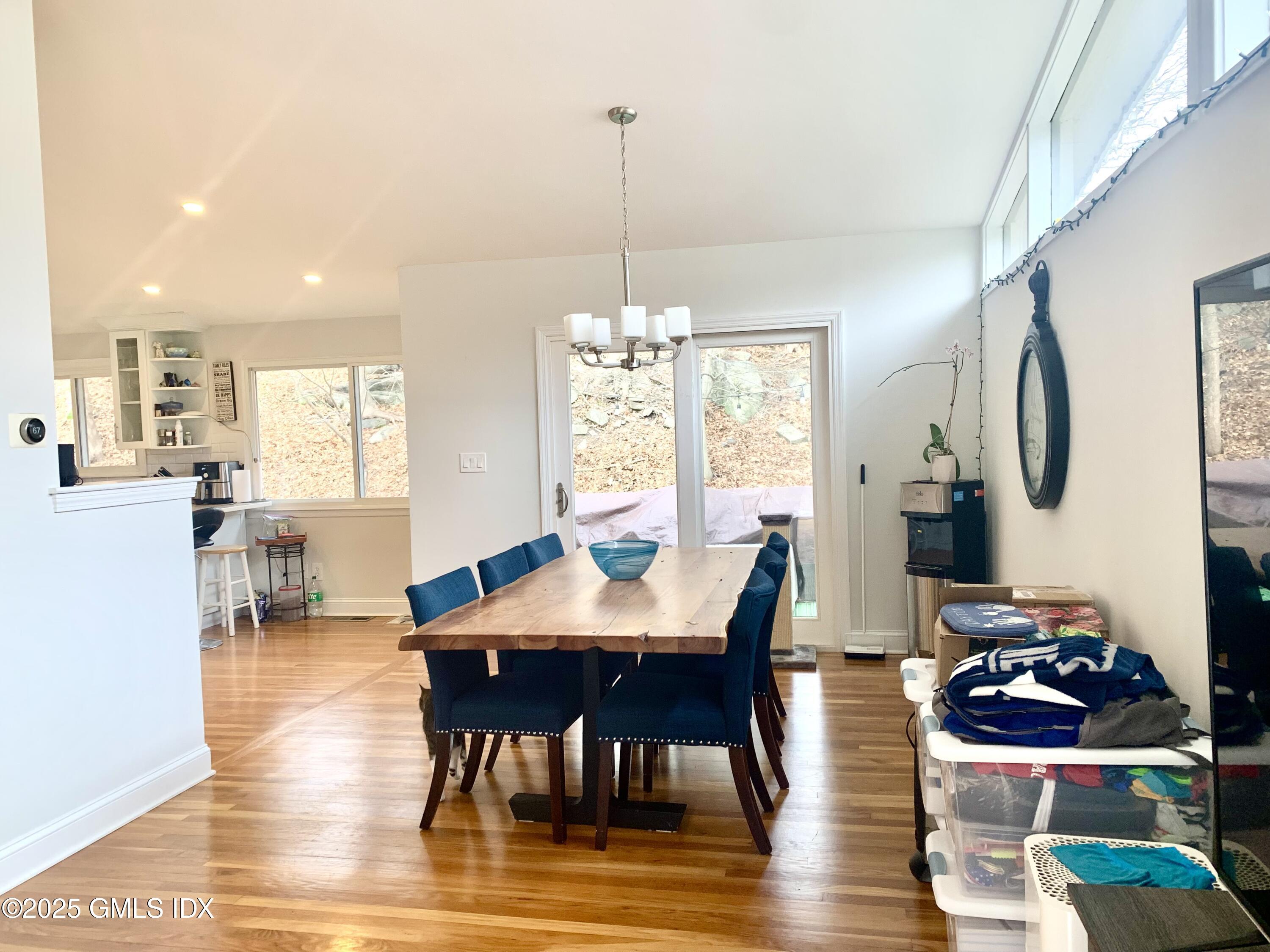 67 Florence Road Riverside, CT 06878 - Photo 5 of 23 a view of a dining room with furniture window and wooden floor
