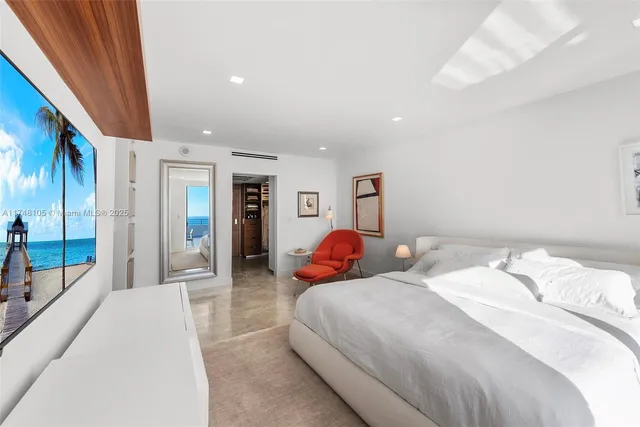 a bathroom with a shower and a mirror