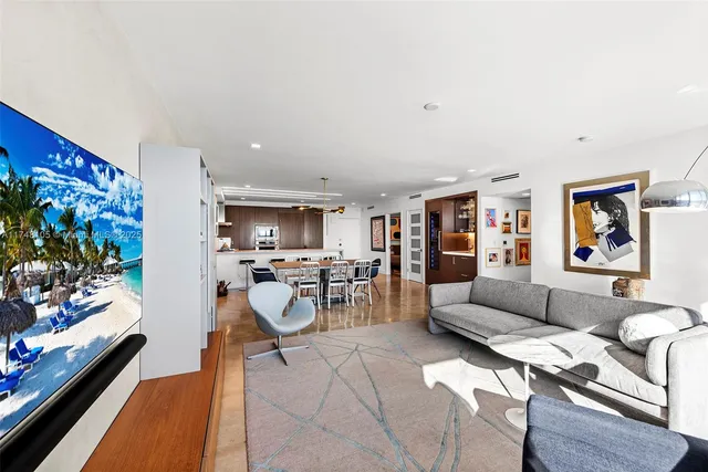 a kitchen with stainless steel appliances a sink and a refrigerator