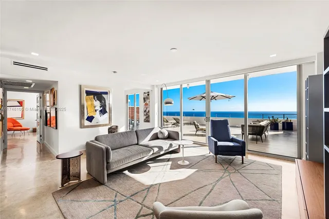 a bedroom with double bed and a large window