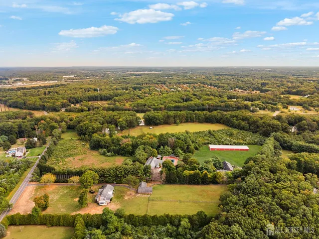 a kitchen with stainless steel appliances a stove a microwave and a refrigerator