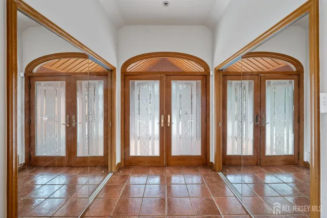 a view of a kitchen with a sink and dishwasher cabinets