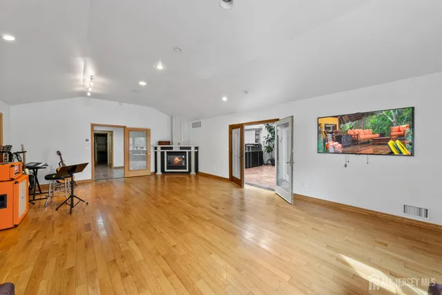 a view of a hallway with seating area