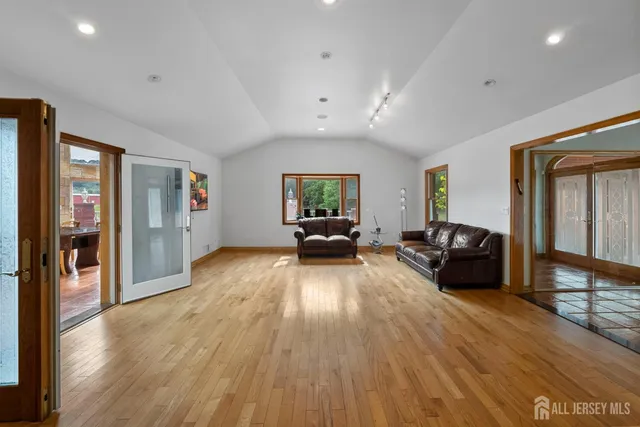 a kitchen with stainless steel appliances granite countertop a sink and cabinets
