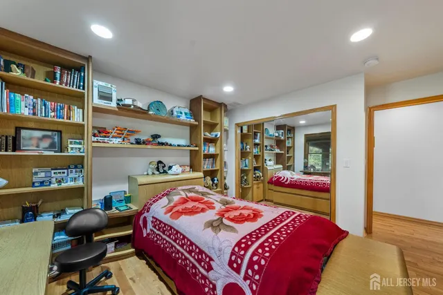 a view of a patio with table and chairs under an umbrella