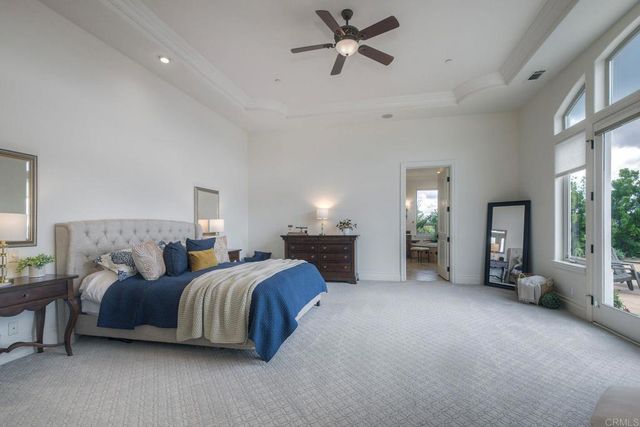 a bathroom with a shower and a mirror