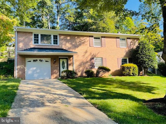 8626 Kerry Lane Springfield, VA 22152 - Photo 1 of 48 a view of a house with backyard and garden