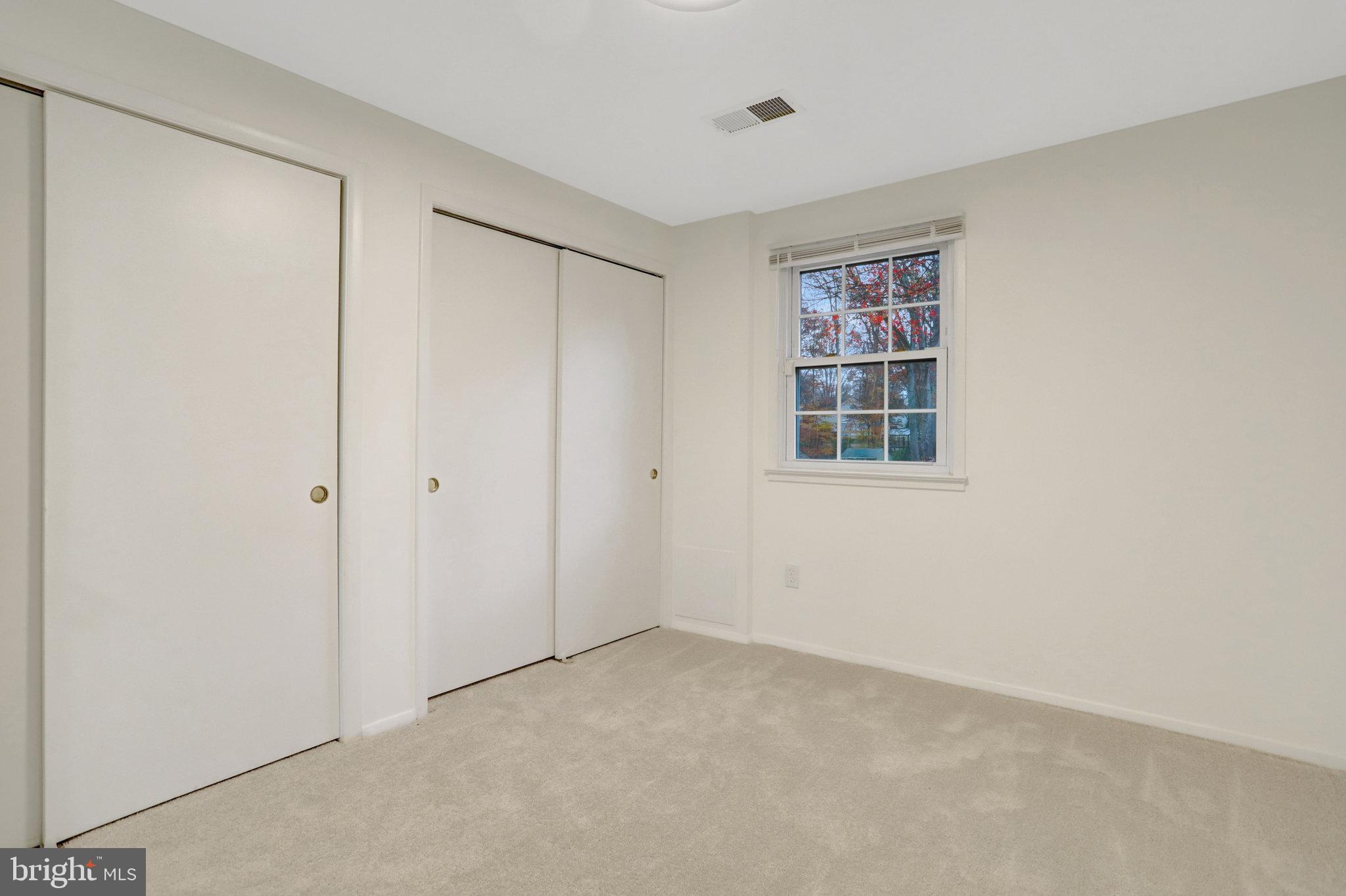 8626 Kerry Lane Springfield, VA 22152 - Photo 11 of 48 a view of an empty room with a window