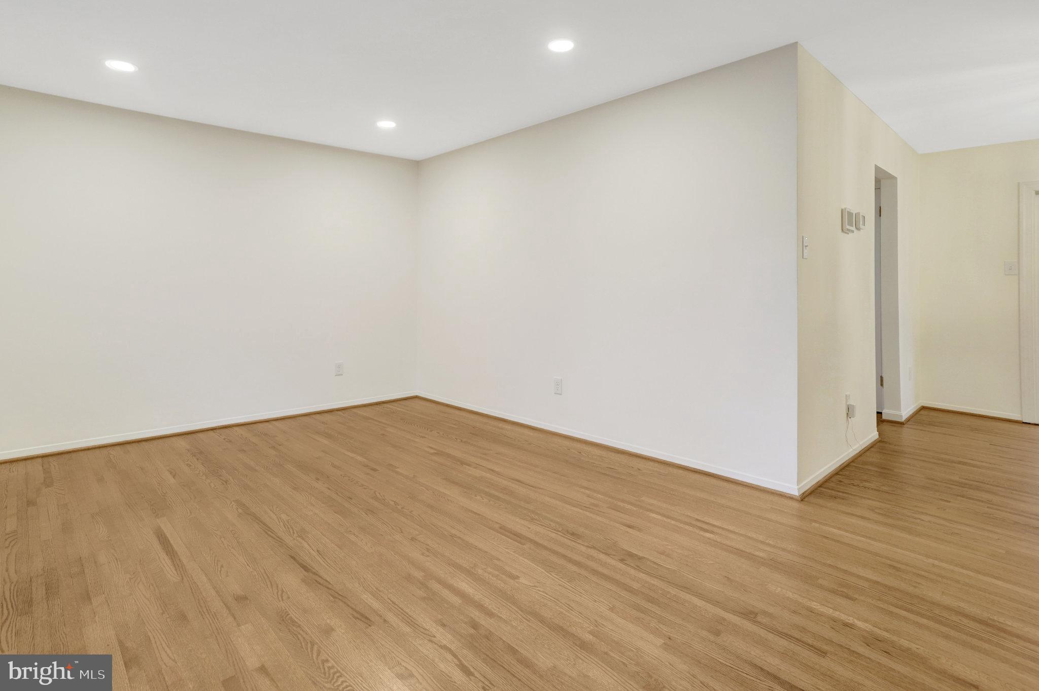 8626 Kerry Lane Springfield, VA 22152 - Photo 20 of 48 a view of empty room with wooden floor