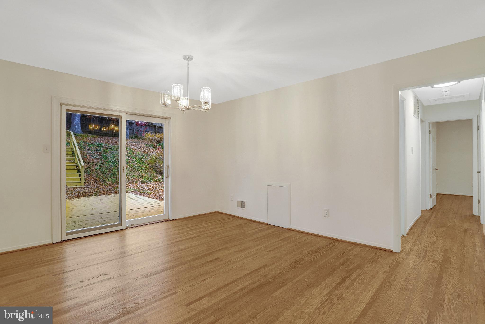 8626 Kerry Lane Springfield, VA 22152 - Photo 28 of 48 wooden floor in an empty room with a window