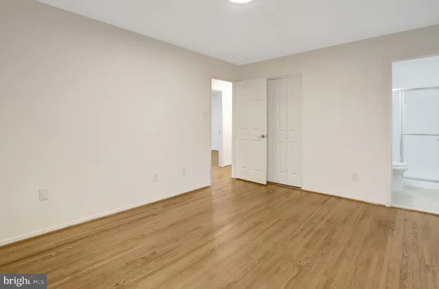 a bathroom with a shower a toilet and a sink