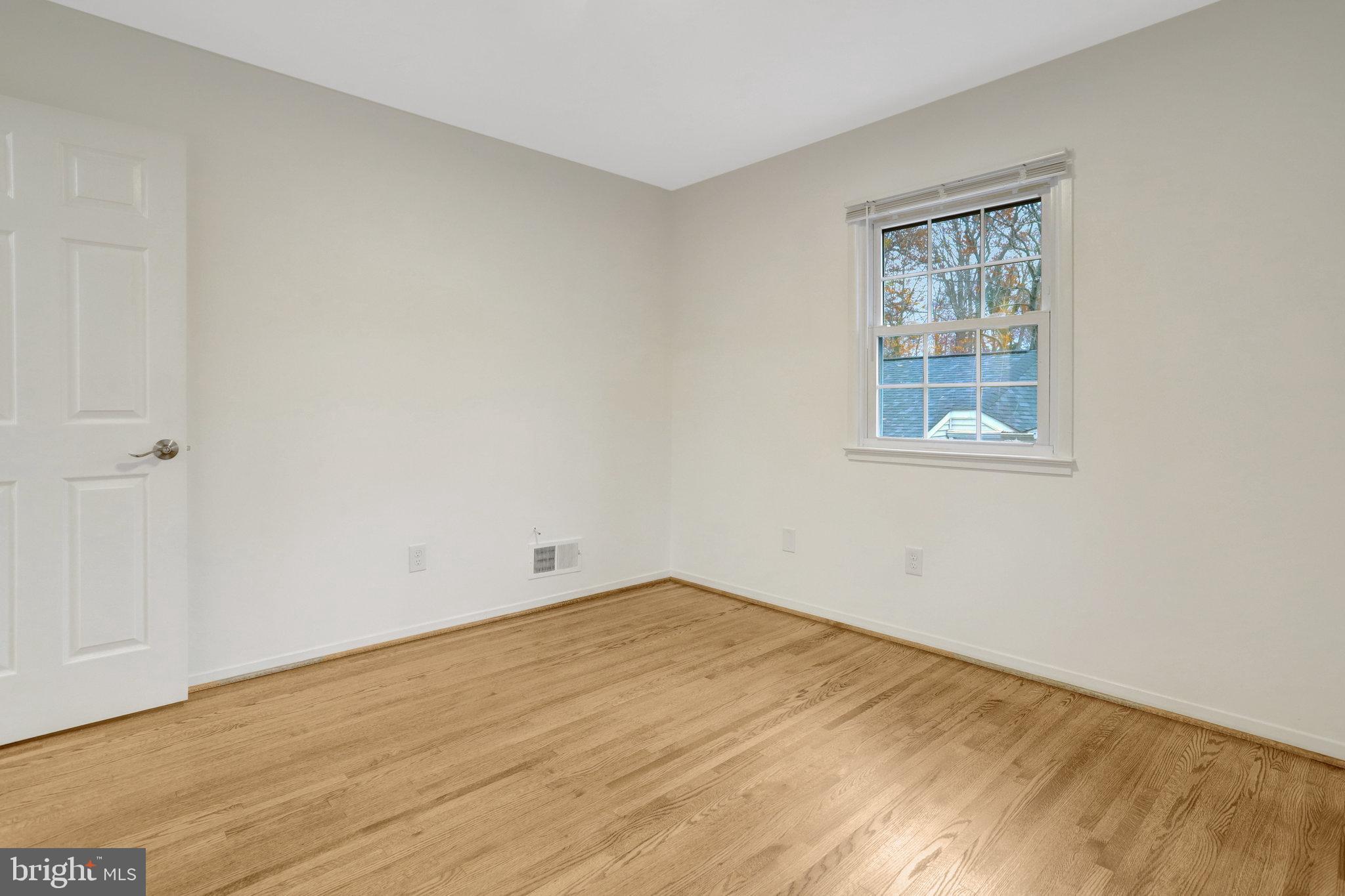 8626 Kerry Lane Springfield, VA 22152 - Photo 39 of 48 an empty room with a window