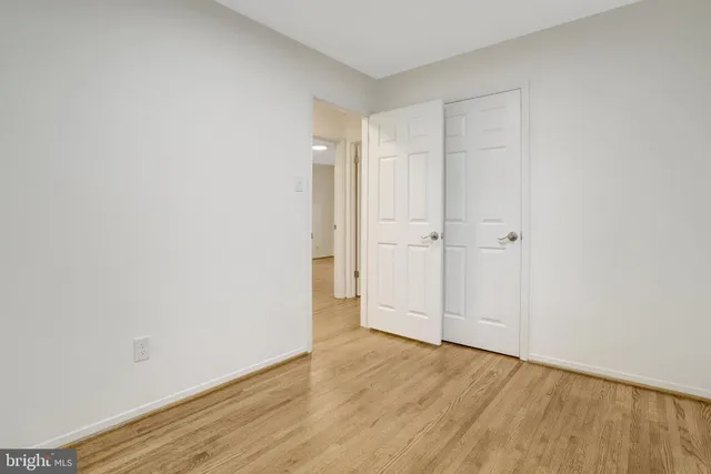 a view of empty room with windows