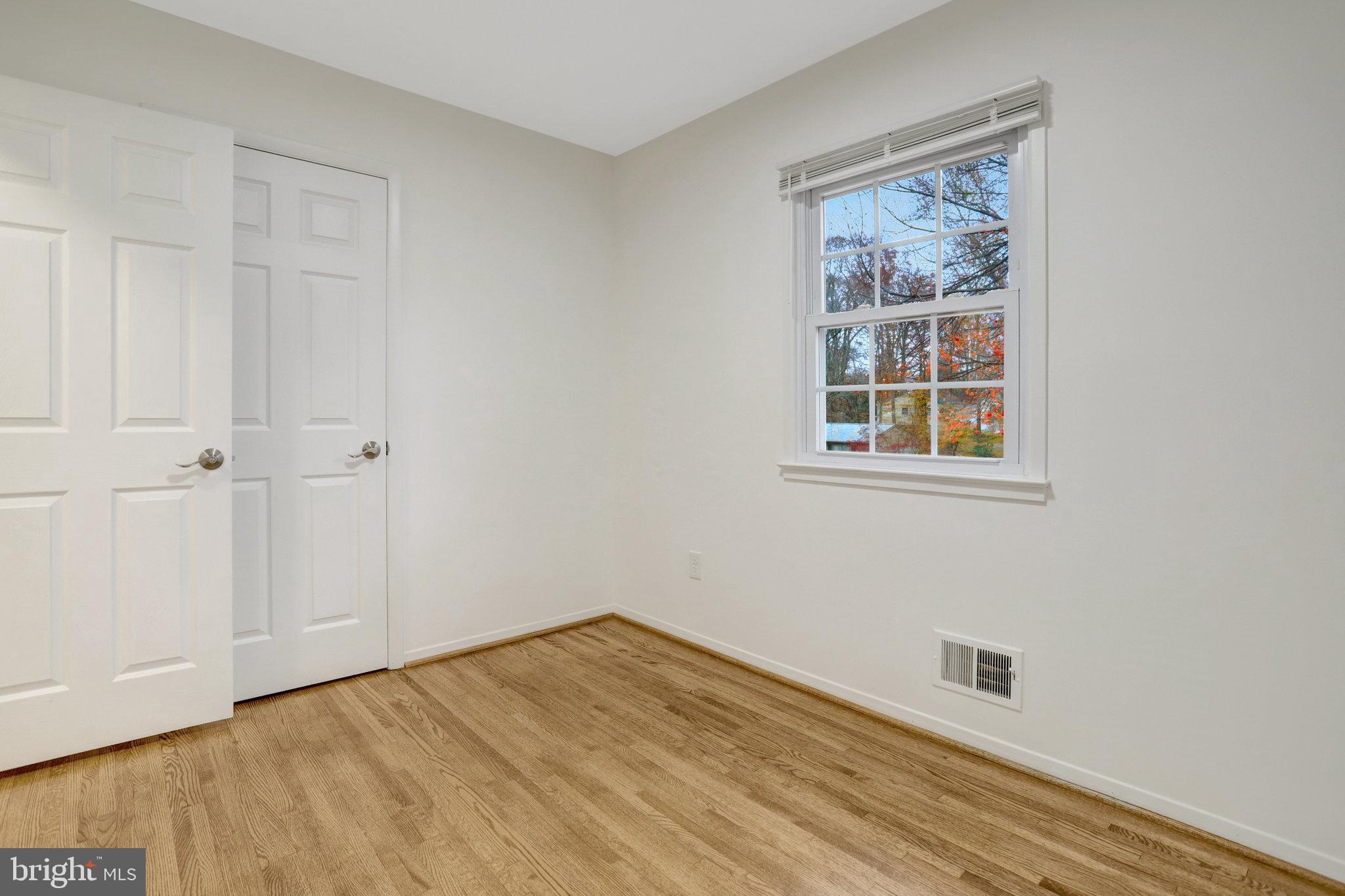 8626 Kerry Lane Springfield, VA 22152 - Photo 41 of 48 a view of empty room with windows