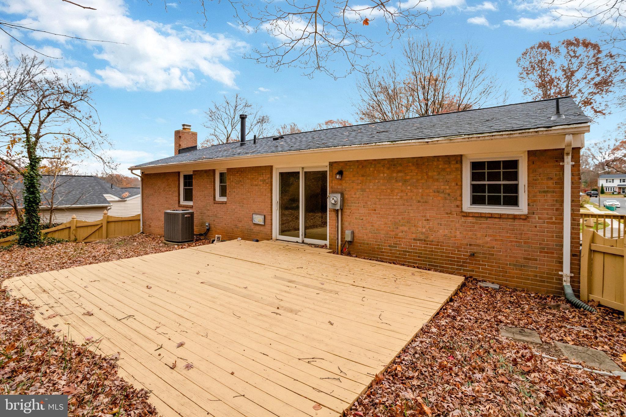 8626 Kerry Lane Springfield, VA 22152 - Photo 45 of 48 a front view of a house with a yard