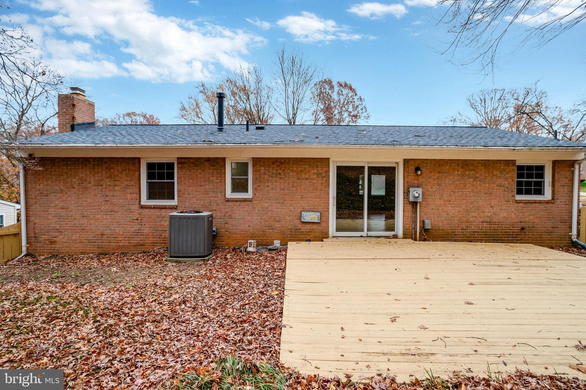 8626 Kerry Lane Springfield, VA 22152 - Photo 46 of 48 a front view of a house with a yard