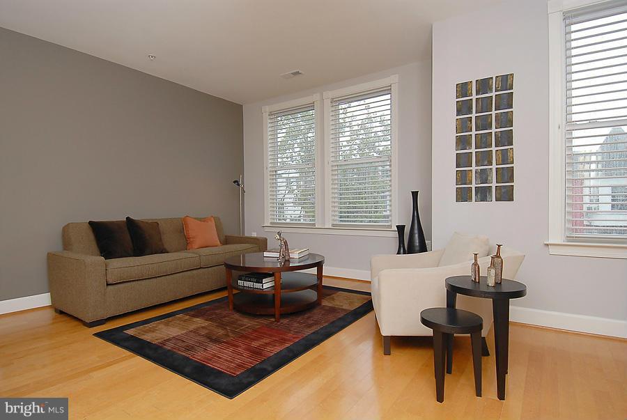 1360 Monroe Street Northwest, Unit B Washington, DC 20010 - Photo 2 of 19 a living room with furniture and a window