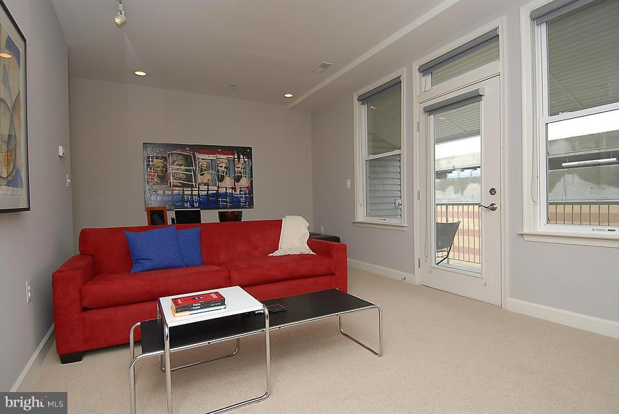 1360 Monroe Street Northwest, Unit B Washington, DC 20010 - Photo 7 of 19 a living room with furniture and a window