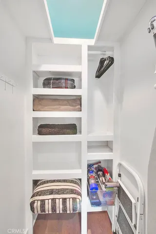 a view of an entryway with wooden floor