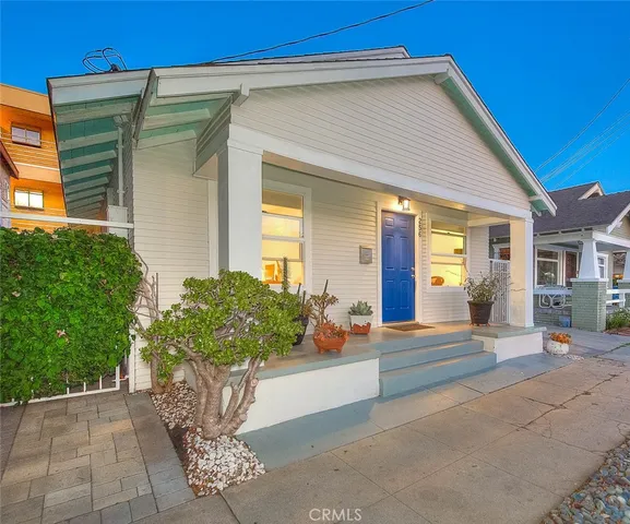 a front view of a house with a garage