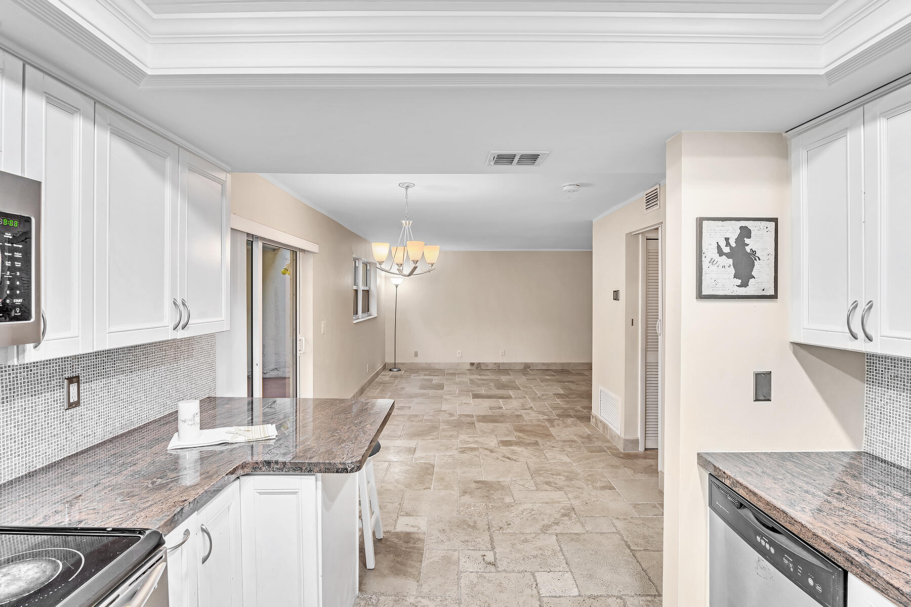 1945 Northwest 4th Avenue, Unit 32C Boca Raton, FL 33432 - Photo 24 of 52 a view of a kitchen cabinets kitchen and a sink
