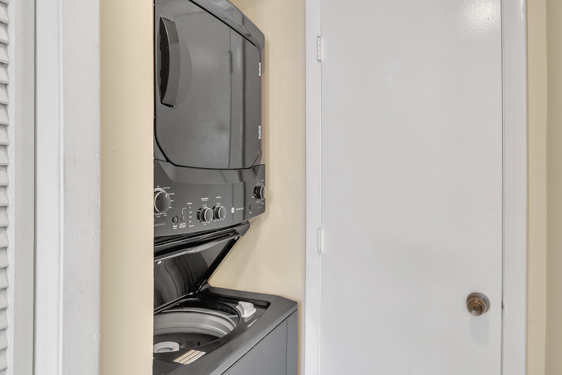 1945 Northwest 4th Avenue, Unit 32C Boca Raton, FL 33432 - Photo 33 of 52 a bathroom with a sink and a mirror