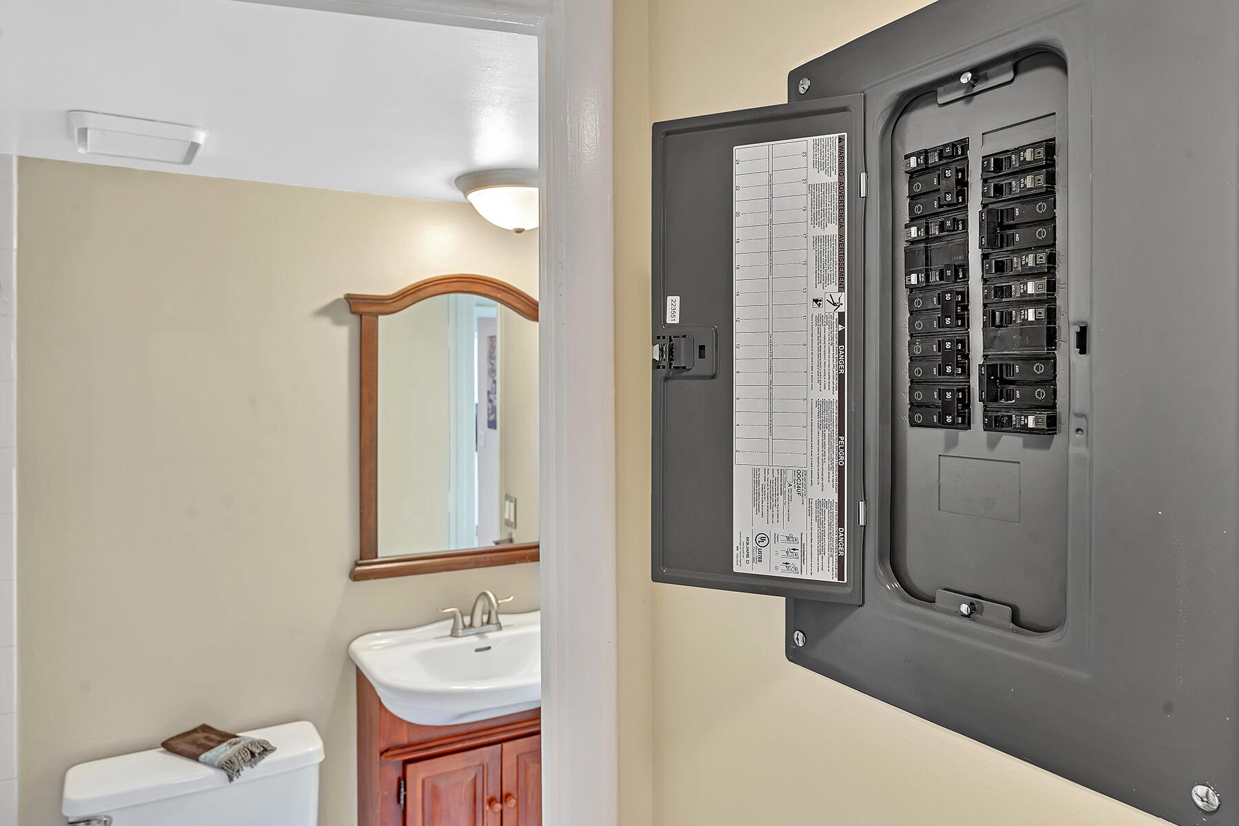 1945 Northwest 4th Avenue, Unit 32C Boca Raton, FL 33432 - Photo 35 of 52 a bathroom with a tub sink and mirror