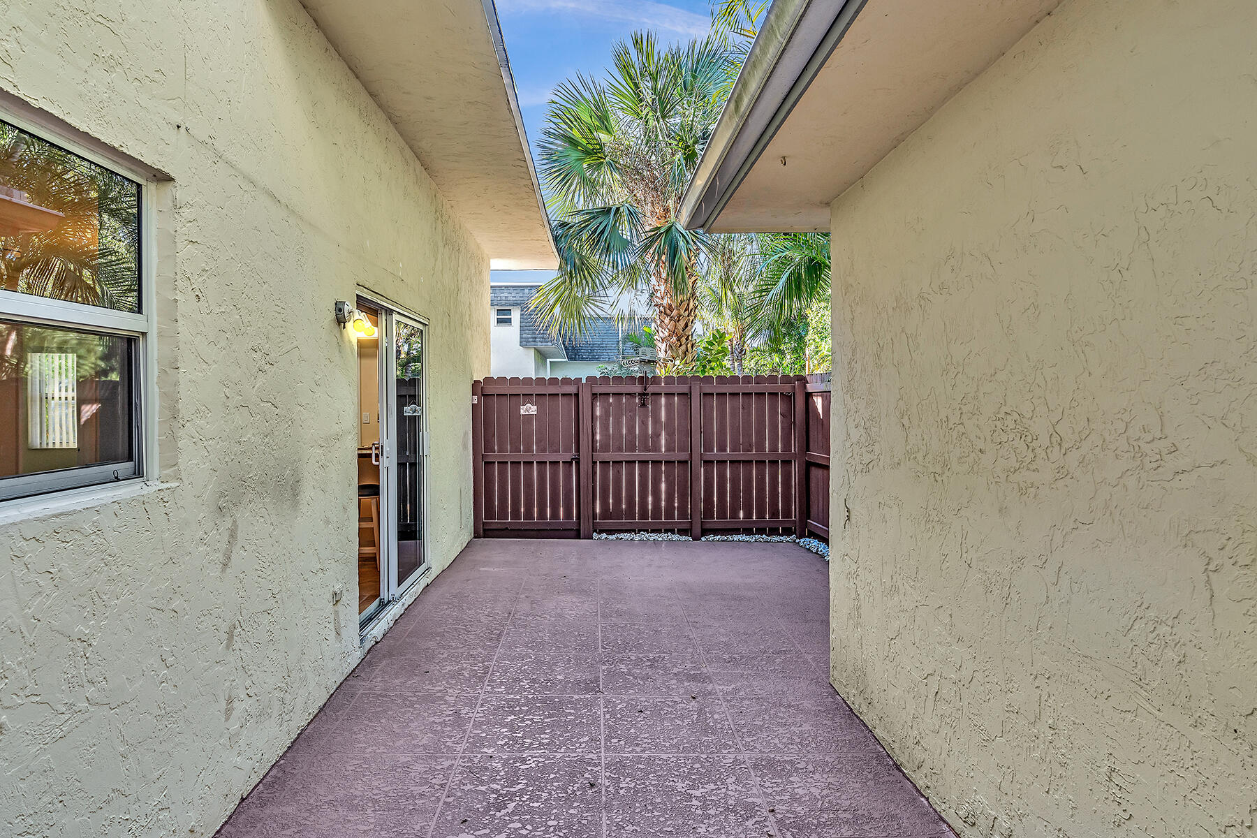 1945 Northwest 4th Avenue, Unit 32C Boca Raton, FL 33432 - Photo 50 of 52 a view of a porch