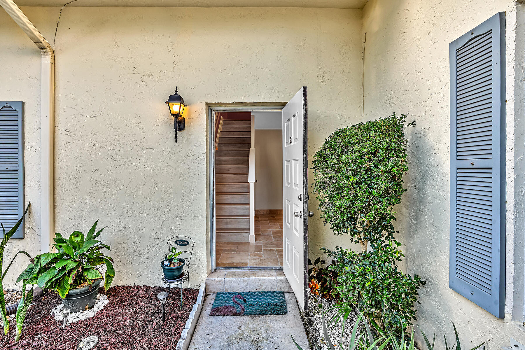 1945 Northwest 4th Avenue, Unit 32C Boca Raton, FL 33432 - Photo 5 of 52 a view of a pathway of the house
