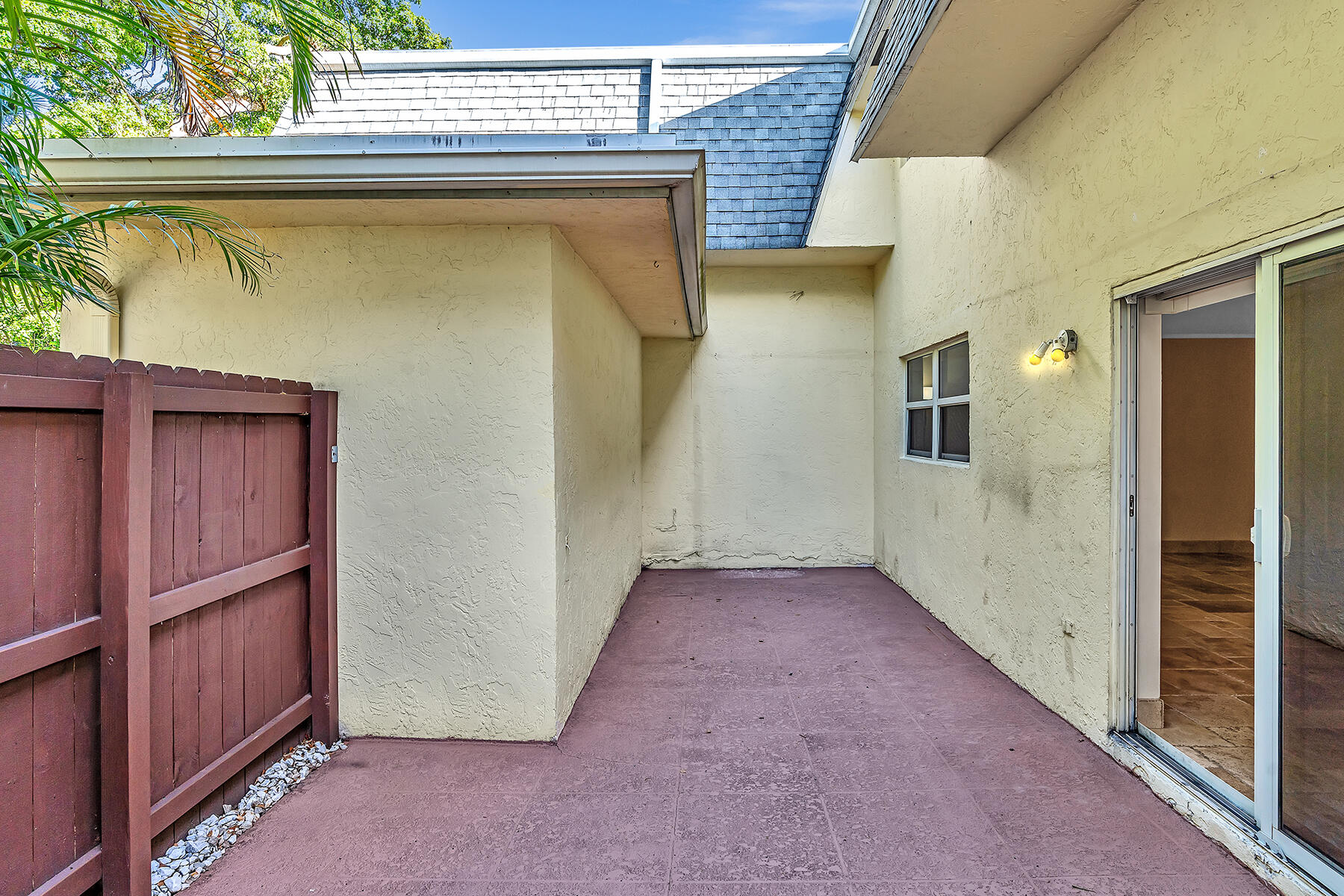 1945 Northwest 4th Avenue, Unit 32C Boca Raton, FL 33432 - Photo 51 of 52 a view of a wooden door