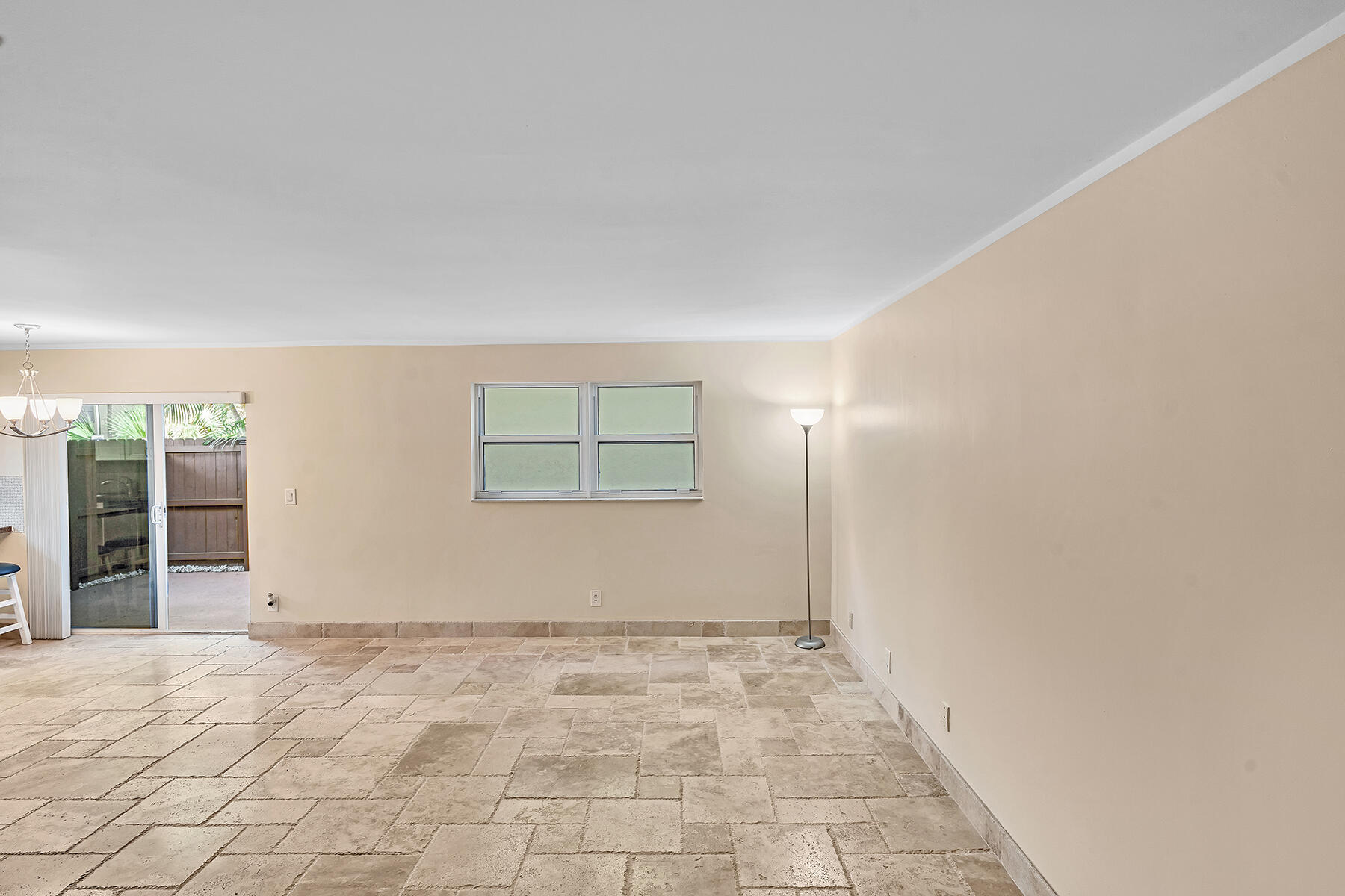 1945 Northwest 4th Avenue, Unit 32C Boca Raton, FL 33432 - Photo 8 of 52 an empty room with windows