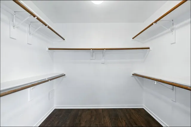 a view of an empty walk in closet